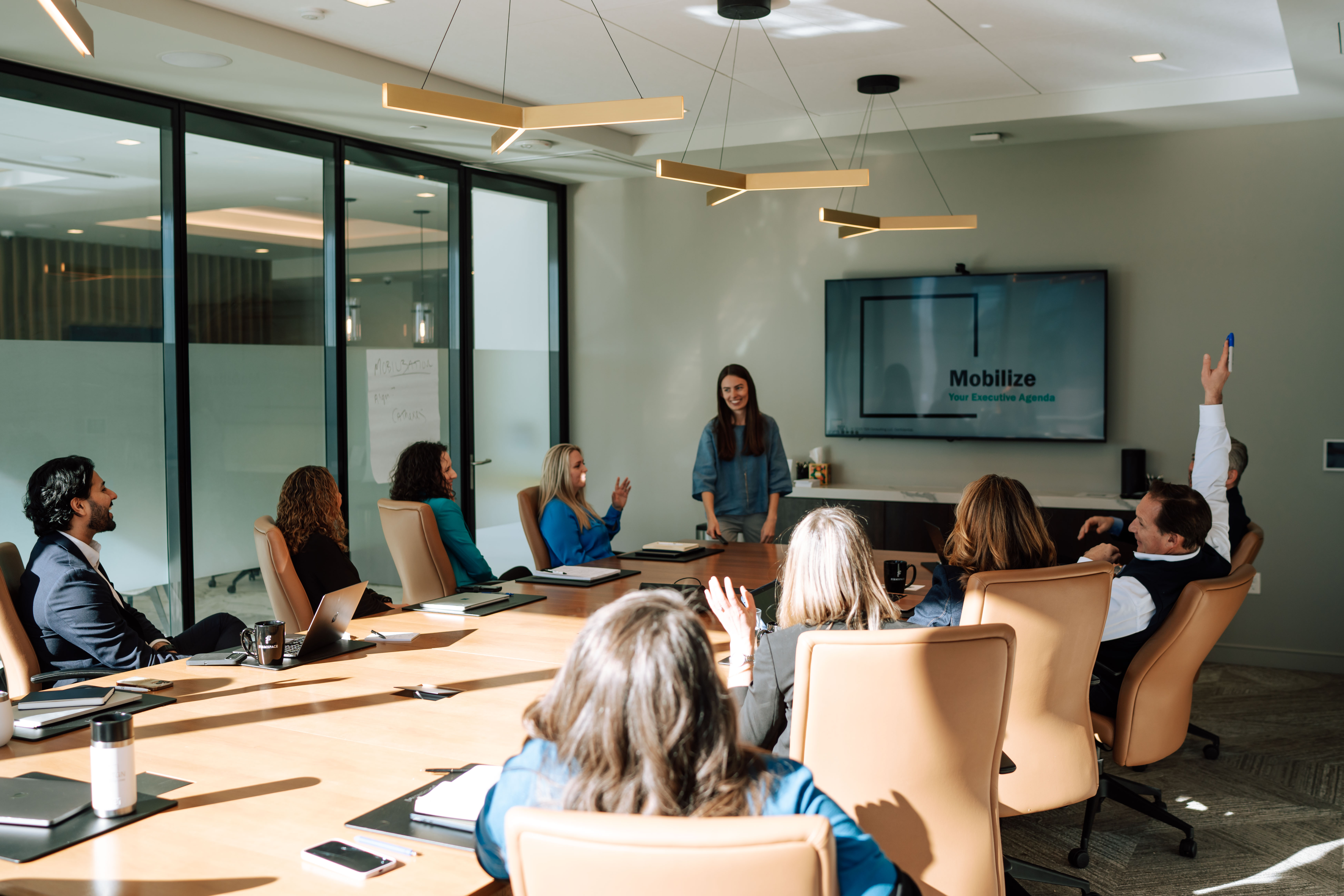 Kari Zeller presenting to a full room